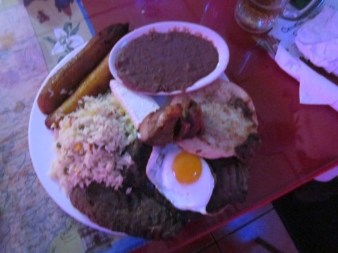 Meat combo with fried egg.