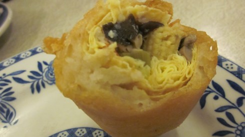 Bonus points if you can also identify what I'm about to stuff into my mouth.