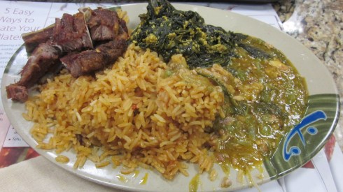 Lamb chops, spinach, okra, and jollof rice.